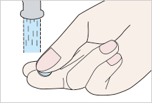 After washing, adequately rinse the lens in tap water (or lukewarm water) until the slimy texture has been removed